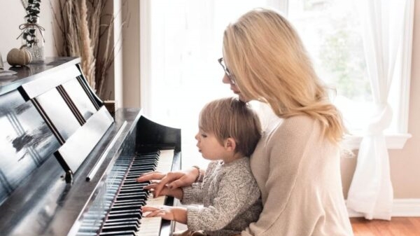 playing the piano with kid